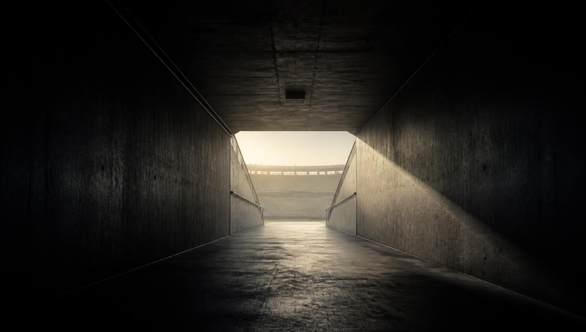 Empty stadium tunnel at dawn